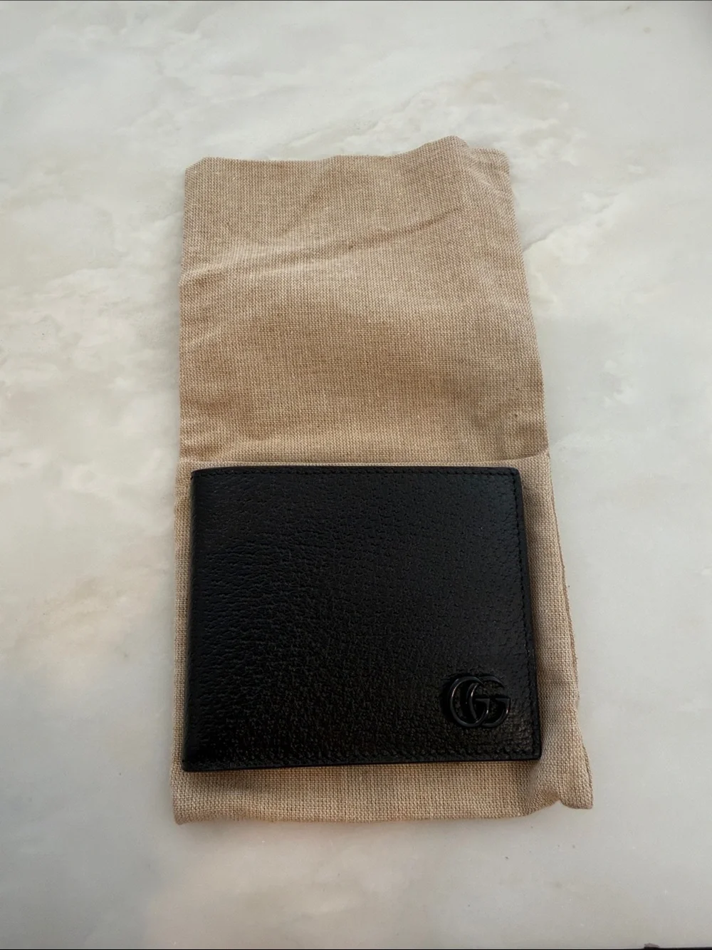 Gucci Black Leather Bi-Fold Wallet with Subtle GG Emblem